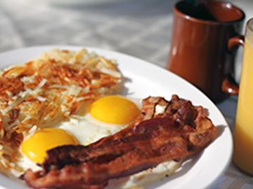 2 eggs sunny side up, 3 pieces bacon, hash browns