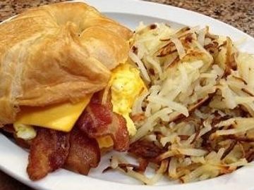 Breakfast croissant with hash browns