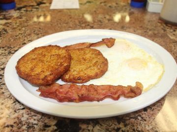 2 x 2 x 2 2 potato pancakes, 2 overeasy eggs, 2 pieces bacon