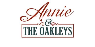 Logo reading 'Annie & The Oakleys' with elegant and bold fonts.