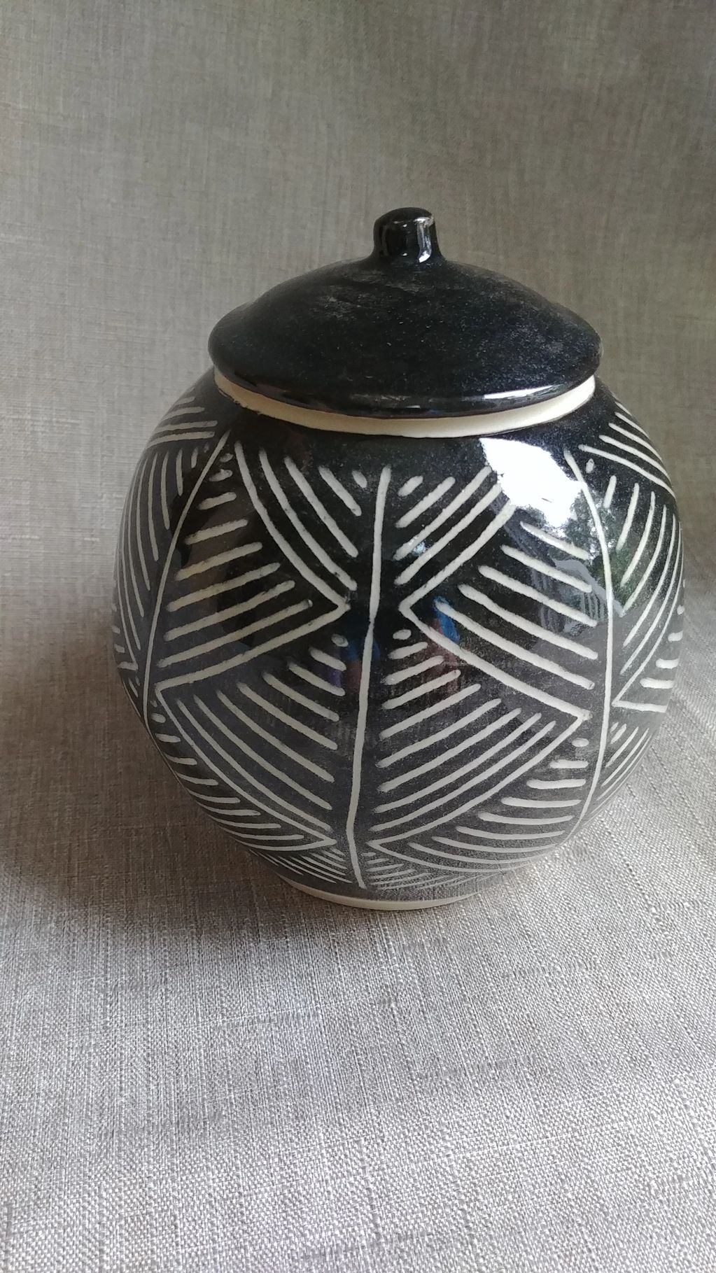 Black and White Lidded Jar,  Black and cream white stoneware. 5" tall. Free delivery in Chittenden.