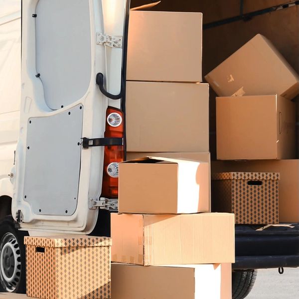 West Midlands same day courier driver loading urgent parcels for delivery across the UK