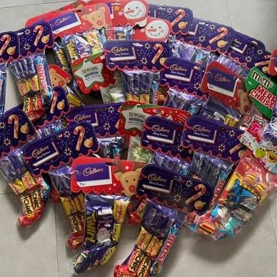 Photo of the chocolate Christmas stockings collected as part of the Care Bags Christmas Drive. 