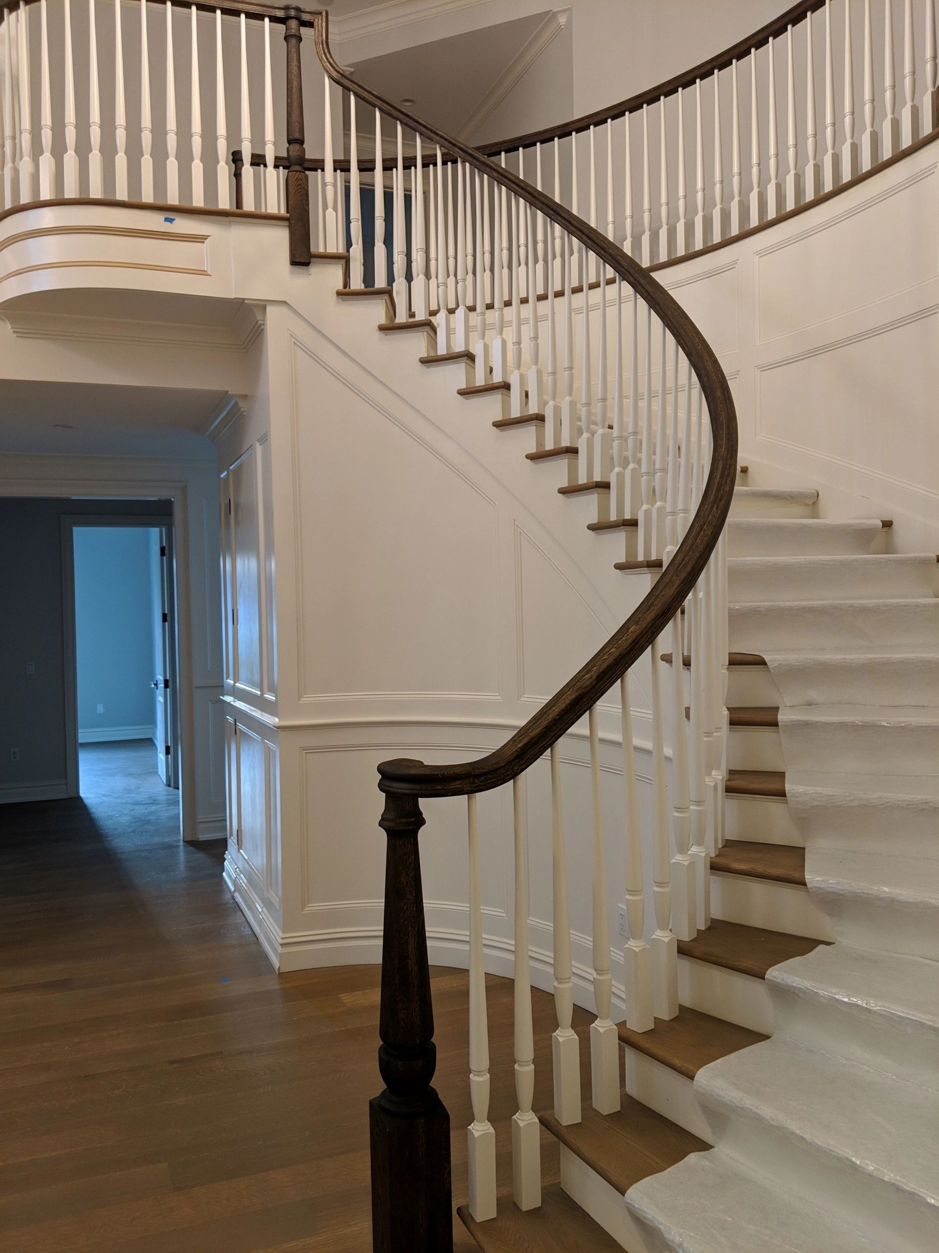 A staircase with our wood railings in Colonia, NJ