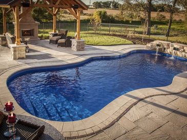freeform pool installed by armstrong pools & outdoors - coral sea