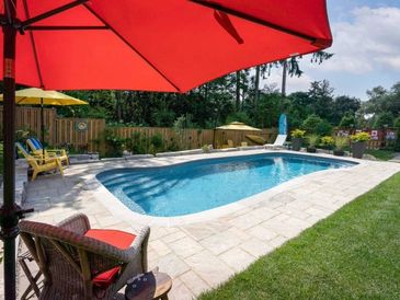 freeform pool installed by armstrong pools & outdoors - southport