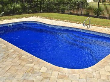 freeform pool installed by armstrong pools & outdoors - sadbury