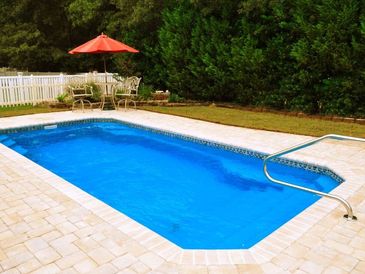 rectangle pool installed by armstrong pools & outdoors - grande