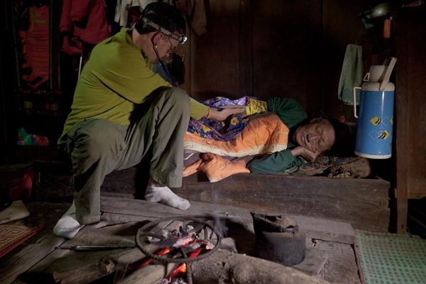 treating a sick villager in the remote village