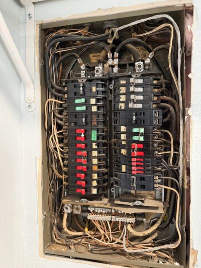 Older electrical panel evaluated during a repair and safety inspection