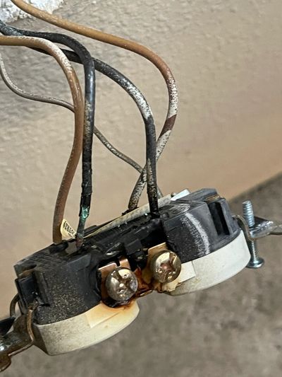 Heat-damaged electrical wiring found during professional troubleshooting