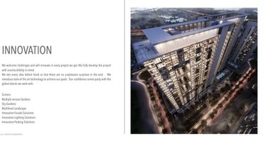 Aerial night view of a modern high-rise building with innovative design elements and lighting.