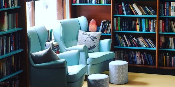 Comfy armchairs in book shop