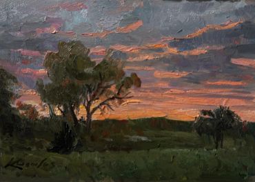Painting of a sunset with trees in the foreground.
