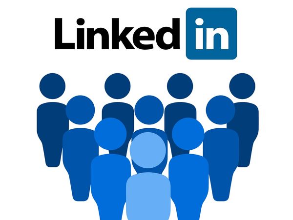 LinkedIn logo with group of blue human icons.