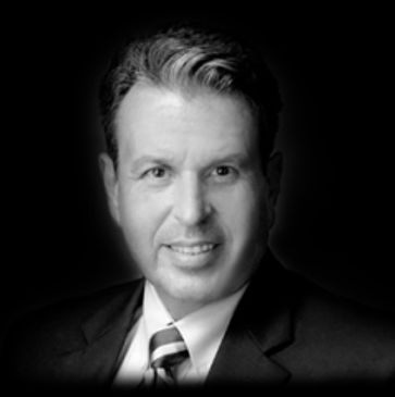 A man wearing a coat, seen from the front