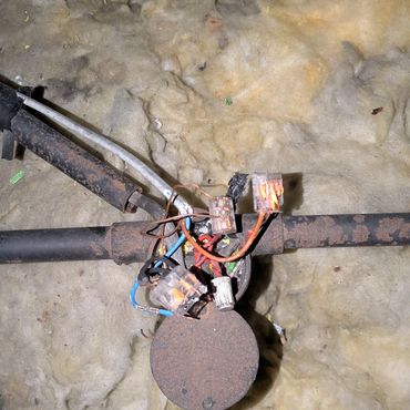 Fault finding, this junction box was found to be chewed by a squirrel causing the lights in the room below to be faulty.