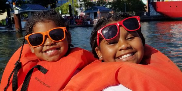 Two kids giving pose for picture