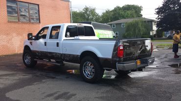 A white pick-up truck (back)