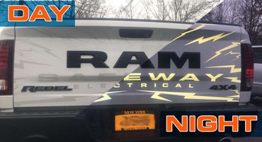 Back of a pick-up truck with glow-in-the-dark vinyl print