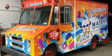 An orange ice cream for Mateer Orthodontics