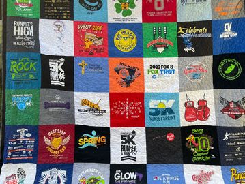 colorful quilt made from t-shirts