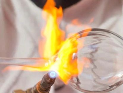 Flame heating a glass object.