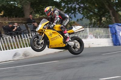 Davey Todd jumping Ducati 916 over Ballaugh bridge at the Isle of ManClassic TT 2025
