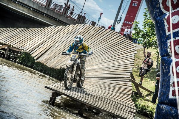 Husaberg FE350 and rider at Redbull Romaniacs offroad day finish line