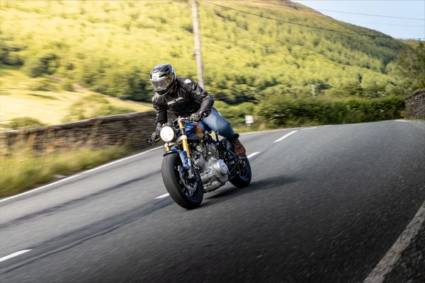 Custom Yamaha XV920 cafe racer being ridden