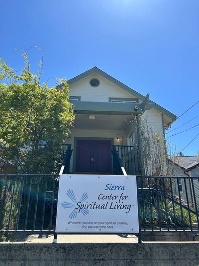 Front view of Sierra Center for Spiritual Living under a clear blue sky.