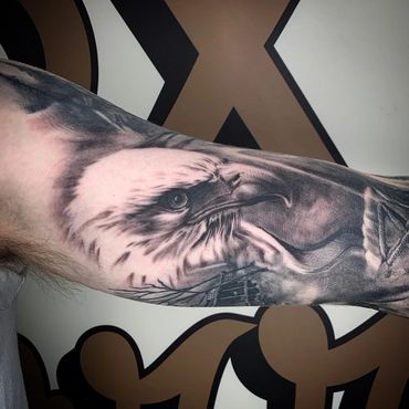 black and gray realism bald eagle tattoo