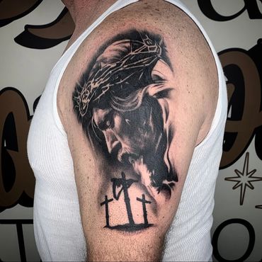 black and gray realism Jesus tattoo with three crosses