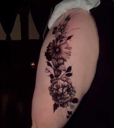 esthetic black and gray floral hip tattoo
