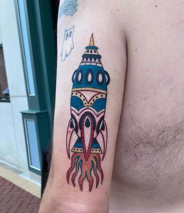 american traditional color rocket rocket ship tattoo
