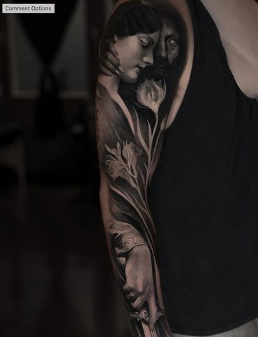 black and gray realism large scale sleeve tattoo of a demon with a woman holding a sword