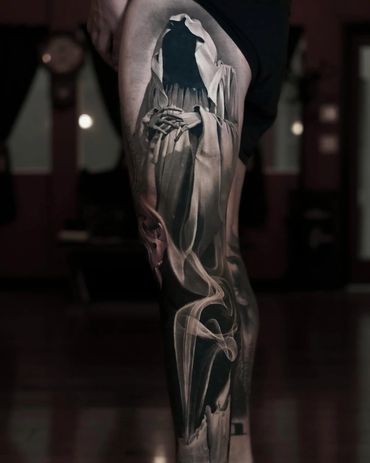 ultra smooth black and gray realism tattoo of a shrouded figure death