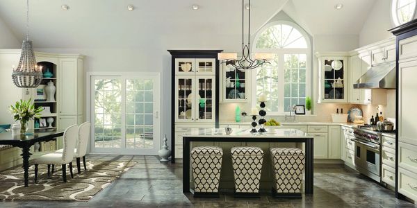 White painted kitchen cabinetry with Ebony contrast features. Merillat Masterpiece Cabinetry.