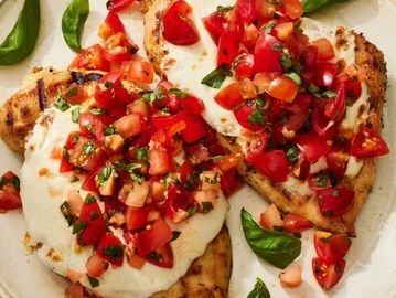 Grilled chicken topped with melted mozzarella and fresh tomato basil salsa.