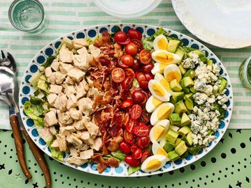 cobb salad chicken bacon tomatoes hard boiled eggs avocado blue cheese ranch dressing