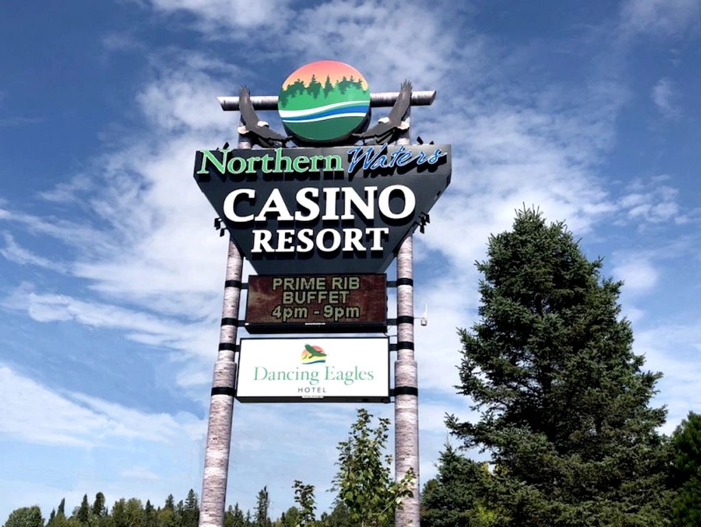 Sign for Northern Waters Casino Resort with a blue sky background.