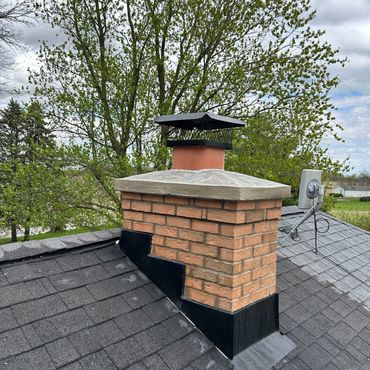 Newly Rebuilt Brick Chimney and Concrete Chimney Crown