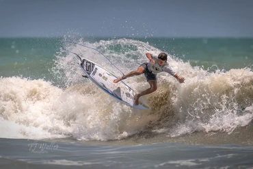 CFL-ESA Contest #4 (5-23-26): DC Lewis surfing Cocoa Beach at dawn by TJ Waller