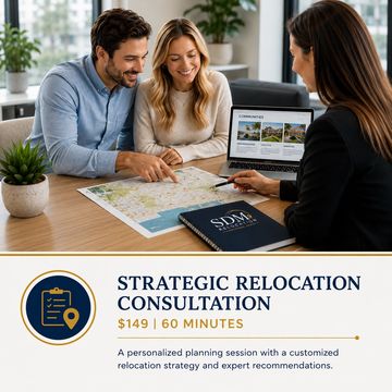 Couple discussing relocation plans with consultant.