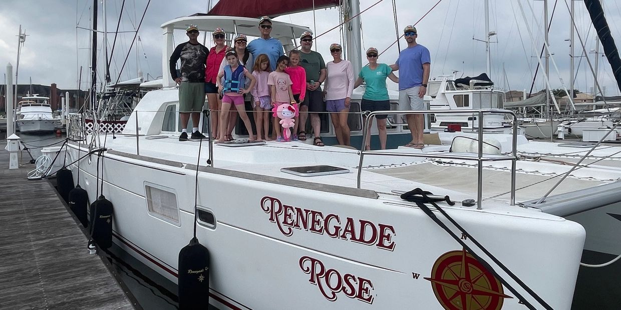 A group of 12 people enjoying an outing.
