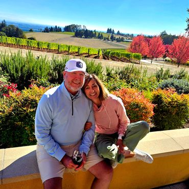Couple enjoying wine on the patio of Domaine Serene Willamette Valley Oregon