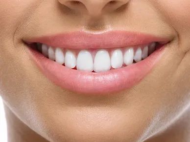 Women Smiling after lip treatment