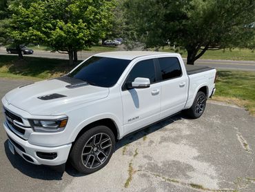 Tinted with Privacy grade film all around including a %98 UV reducing front windshield tint.