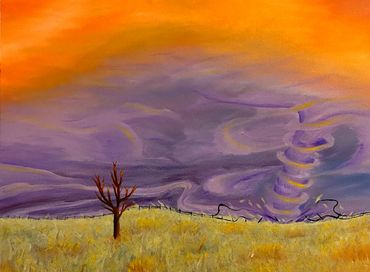 An orange and purple sky kissed with a cyclone approaching an open field.