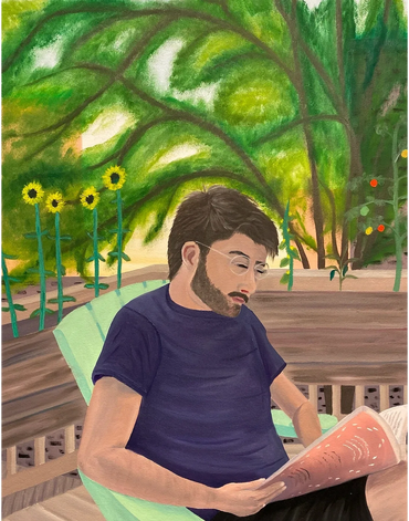 A self-portrait of myself sitting in a chair outside while reading a book.